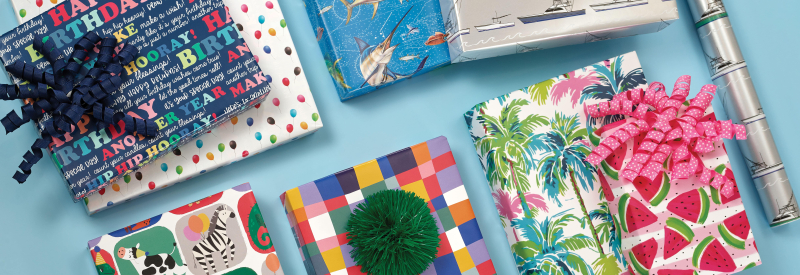 banner-01-01-min-min Assorted Christmas wrapping paper and gift wrap, featuring Charleston Wrap fundraising for seasonal gift wrapping needs.