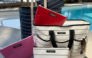 Assorted bags are positioned next to a pool, each displaying unique patterns and colors.
